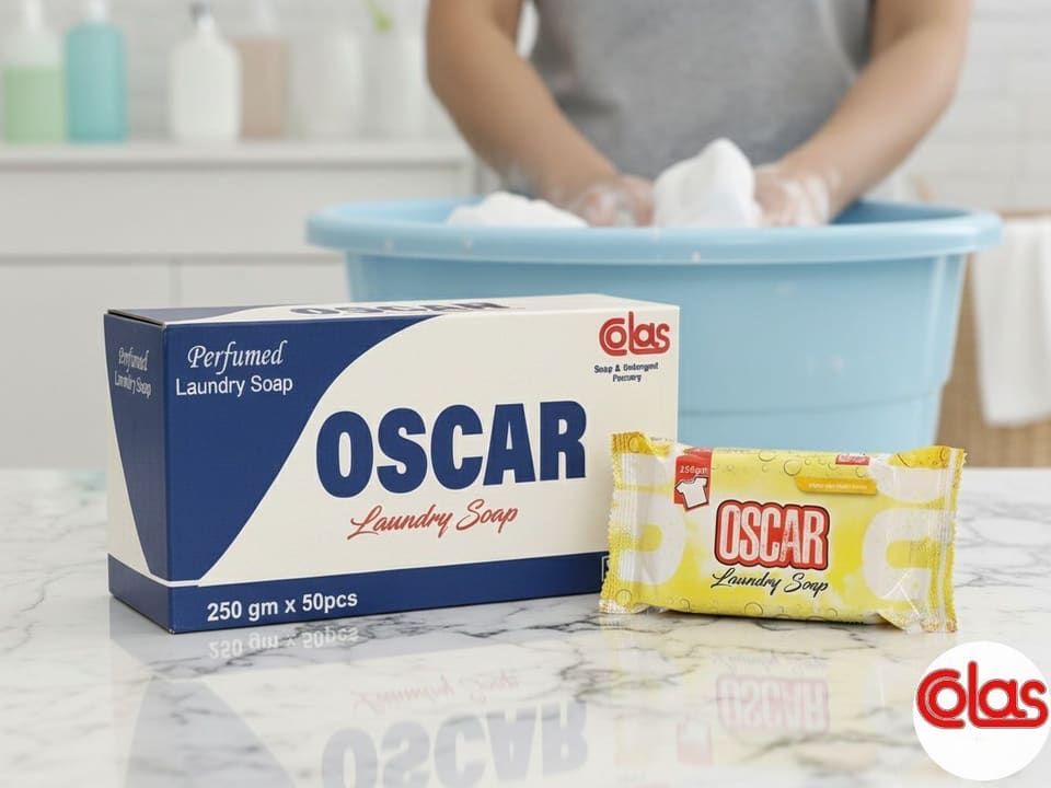 An OSCAR Perfumed Laundry Soap carton in front of a wash basin.